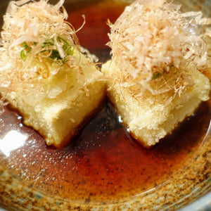 Deep fried tofu, bonito flakes, bathed in house dashi broth.